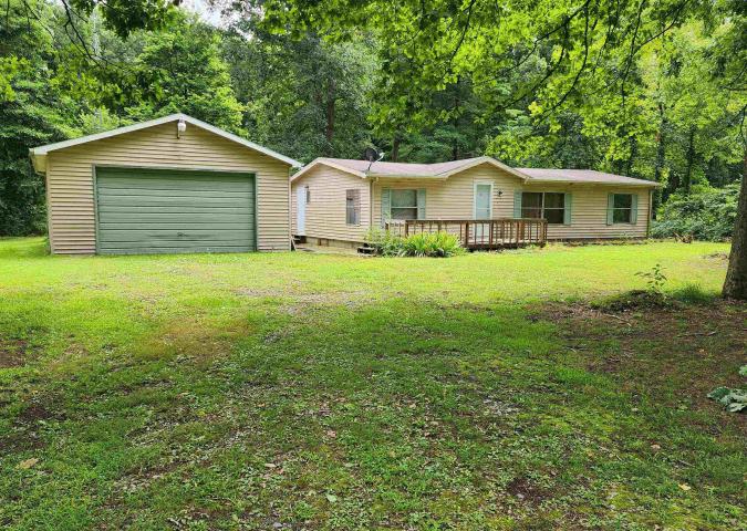 Front of home and garage.