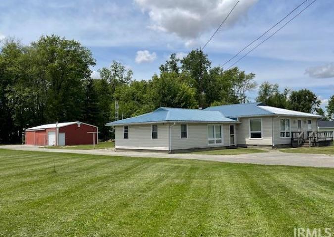 Front Side with Pole Barn