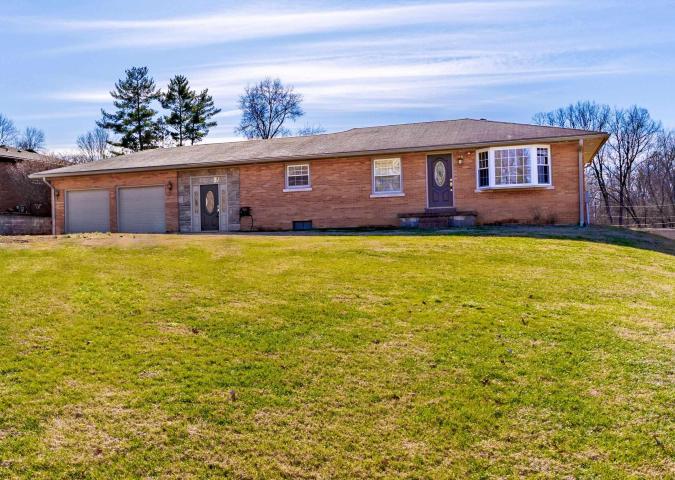 Welcome to 110 W Mount Pleasant Rd situated on nearly an acre on Evansville's North Side!