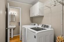 Laundry Room with 1/2 bath off of it