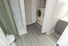 Lower level full bathroom with laundry