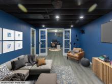 Lower level rec room with office at the end