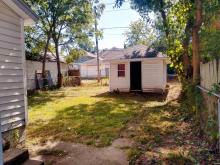 Backyard with garage