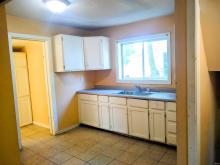 Kitchen w/door to 1/2 bath