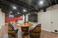 Basement family/rec room with new vinyl plank flooring